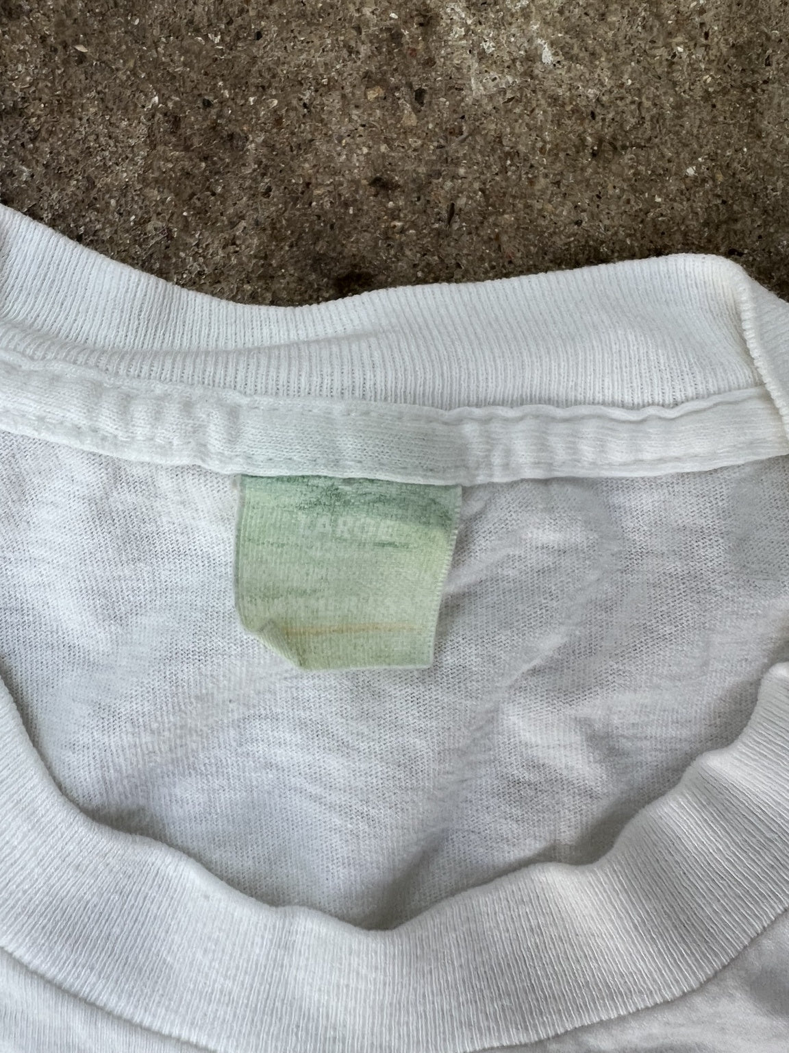 Faded neck tag